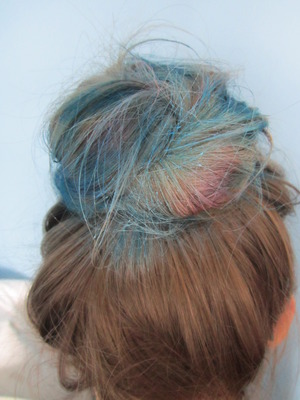 Blue and purple bun done with colour xtreme hair art spray.