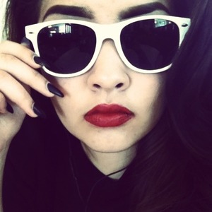 Black matte nails, maroon lips, and white glasses. ;) 