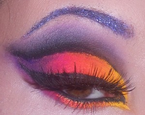 I love Lisa Frank, so I took inspiration from her bright colorful creations and turned it into a makeup look! 