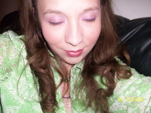 very simple look using light purple shadow with plum eyeliner  with a sweep of shimmer pink on low lids and two coats mascara the lipstick is avon my lip miracle in shade raspberry frost 