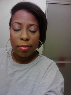 A very plain look..This is another old pic so I have no idea what's on my face but it looks like my NAKED palette and a MAC red gloss.