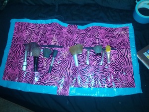 so I needed a brush belt but wanted something different I had been looking online but all of them were kinda boring blk bla sooo I got a bright idea to make me one and it was CHEAPER !!! ; -) 