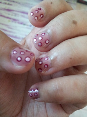 simple mani using dotting tool amd your choice of nail paints