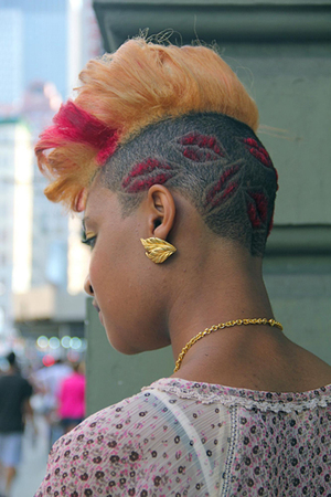 I found this hair cut on tumblr  I just lovedd it !!!  Look at the RED LIPS shaved in the back of her head soo cute