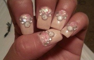 These were my prom nails skin colored with jewels and glittery nail polish:)