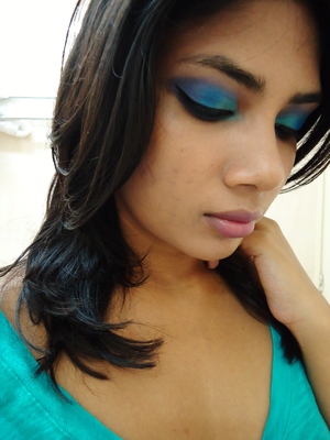 This is a colorful look for clubbing using turquoise, blue and purple. Hope you enjoy.

