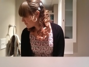 my fun pink end hair all curled :P cute flower pins (favorite color!)