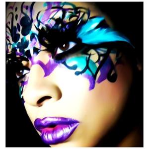 This look I created using extrem lashes and face paint. I freestyled the drawings once I completed the foundation.