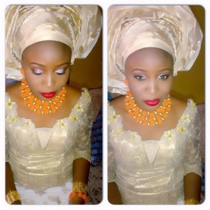 Nigerian bride with a head gear