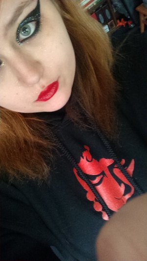 Black and white glitter eyes with red lip.