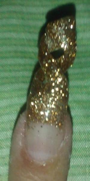 Double spiral gold glitter acrylic nail... these are really easy to do if you already know how to apply nail acrylic or nail gels
