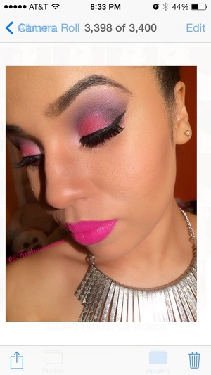 Fun purple & pink w/ a hint of glitter on the eyes and some in your face hot pink lipstick! 