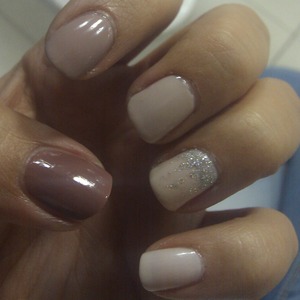 Nude ombre nails with some silver glitter
