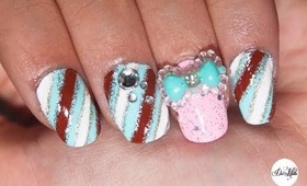 Design with bows and stripes featuring a new nail art wheel!
