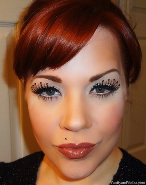 To see the complete post, please visit:
http://www.vanityandvodka.com/2013/06/1920-to-2000-makeup-for-each-decade.html
:-)