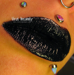 Virus Insanity lipgloss, Black Death.
http://www.virusinsanity.com/#!lipglosses/vstc9=all-lipglosses/productsstackergalleryv29=1