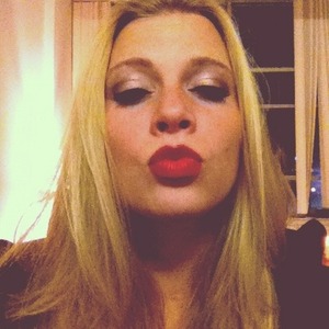 Red lips with gold and brown eyeshadow