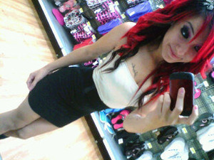 Red nd black hair, wit curls done by my HAi straightener. 