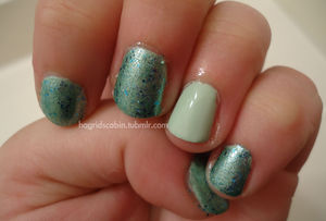 Urban Outfitters "Sea Dust" over China Glaze Re-Fresh Mint. I've added my tumblr url as a sort of water mark. We'll see if I keep it. 