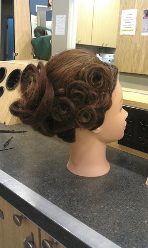 A side view of the rose french twist. Originally Created for a "Wedding Updo" competition at my school, placed in 3rd :)  