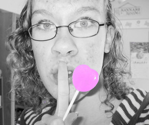 Shhh, don't tell my sis I took her lollypop. :D