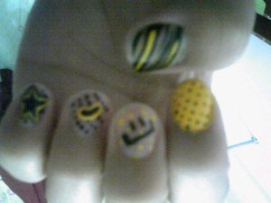This was my VERY FIRST nail design ever! I know it is blurry but I was not a good photographer before.