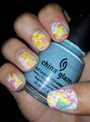 I am absolutely in love with these splatter paint nails.

For this design I used:

Wet N' Wild- French White (base)
Sally Hansen Xtreme Wear- Mellow Yellow (paint splatter)
Sally Hansen Xtreme Wear- Bubblegum (paint splatter)
Sally Hansen Xtreme Wear- Sun Kissed (paint splatter)
China Glaze- For Audrey (paint splatter)