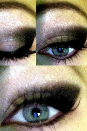 Black, gray and a dark steel blue to make this smokey eye. With cat eye eyeliner and fake eyelashes 
