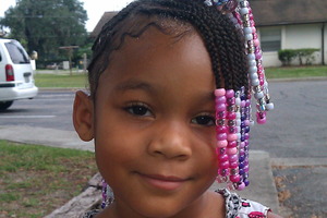 My baby Mya just got her hair braided. 