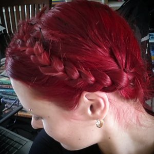 My first attempt at milkmaid braids.  Excuse the flyaways, I didn't use any product  ??