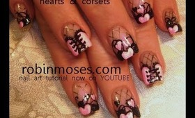 pink ruffle corset with pink and black hearts: robin moses nail art tutorial
