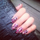 Pink and black leopard nails