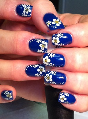 Clear gel, colored gel in 'blueberry', and hand painted flowers