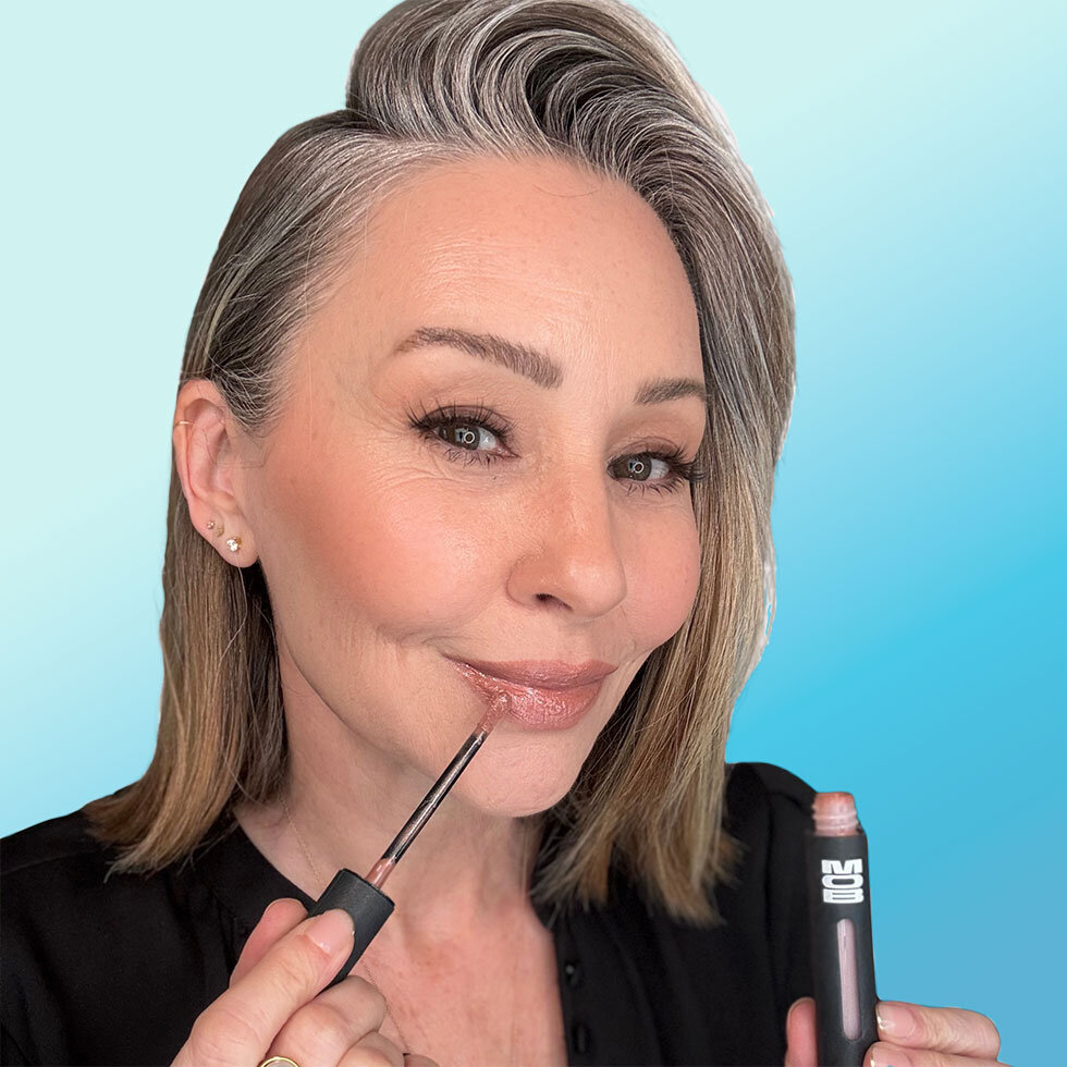 Michelle using MOB Beauty Peptide Drench Cushion Lip Gloss in St. Tropez