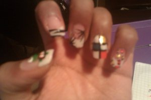 My nails were growing out so I decorated every single one differently.