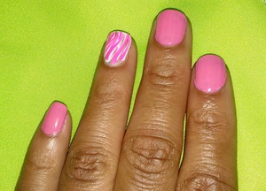 pink nails with a pink and white stripe ring finger