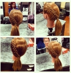 Practicing five strand braids on my mannequin head in my cosmetology class