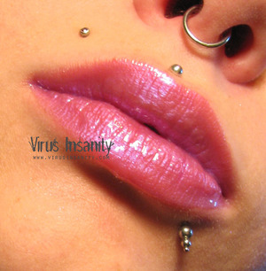 Virus Insanity Viole(n)t lipgloss.
http://www.virusinsanity.com/#!lipglosses/vstc9=all-lipglosses/productsstackergalleryv29=6