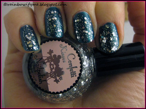Model's Own, "Peacock Green", covered with H&M's "Confetti Kisses". 
Read more about this mani on my blog, here:
http://rainbowifyme.blogspot.com/2012/01/models-own-peacock-green.html