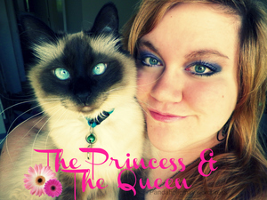 Me and my Kittah. I'm sporting purple eyes in this one. Not something i do a lot. :]