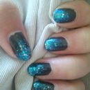Black and blue glitter nail art