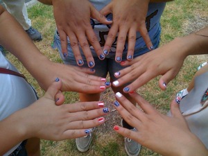 i did my nails  with the 13 stripes and 50 stars! the on 4th of July i did my sisters and cousins nails at the park:]