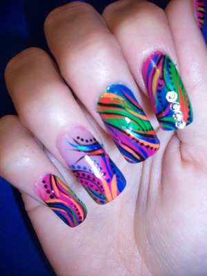 Colors! different design on each nail, funky designs, and flashy....my fav! hehe~