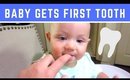 BABY'S FIRST TOOTH!!