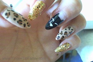 DETAILS BELOW:
http://fingertipfancy.com/cat-leopard-tutorial-nails