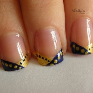 Clear polish with Navy blue and use a dotting tool for the Gold 