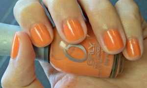 Nice sheer-ish pinky/orange color.. Built up 2-3 coats for a nice pop of color that still has transparency.. 