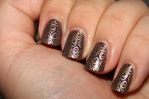 Base: Golden Rose Paris Nail Lacquer 120. Stamped on top using plate BM-212.

http://iloveprettycolours.blogspot.com/2011/10/golden-peacock.html
