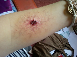 had a little go at special effects makeup, created a nice infected alien wound :d