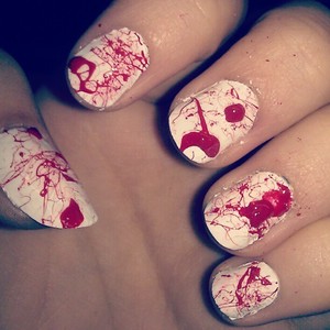 Scary Halloween themed Blood Splatter Nail Art, very effective yet easy to do, just be prepared for the clean up afterwards! :) (Pre-Clean up pic!)